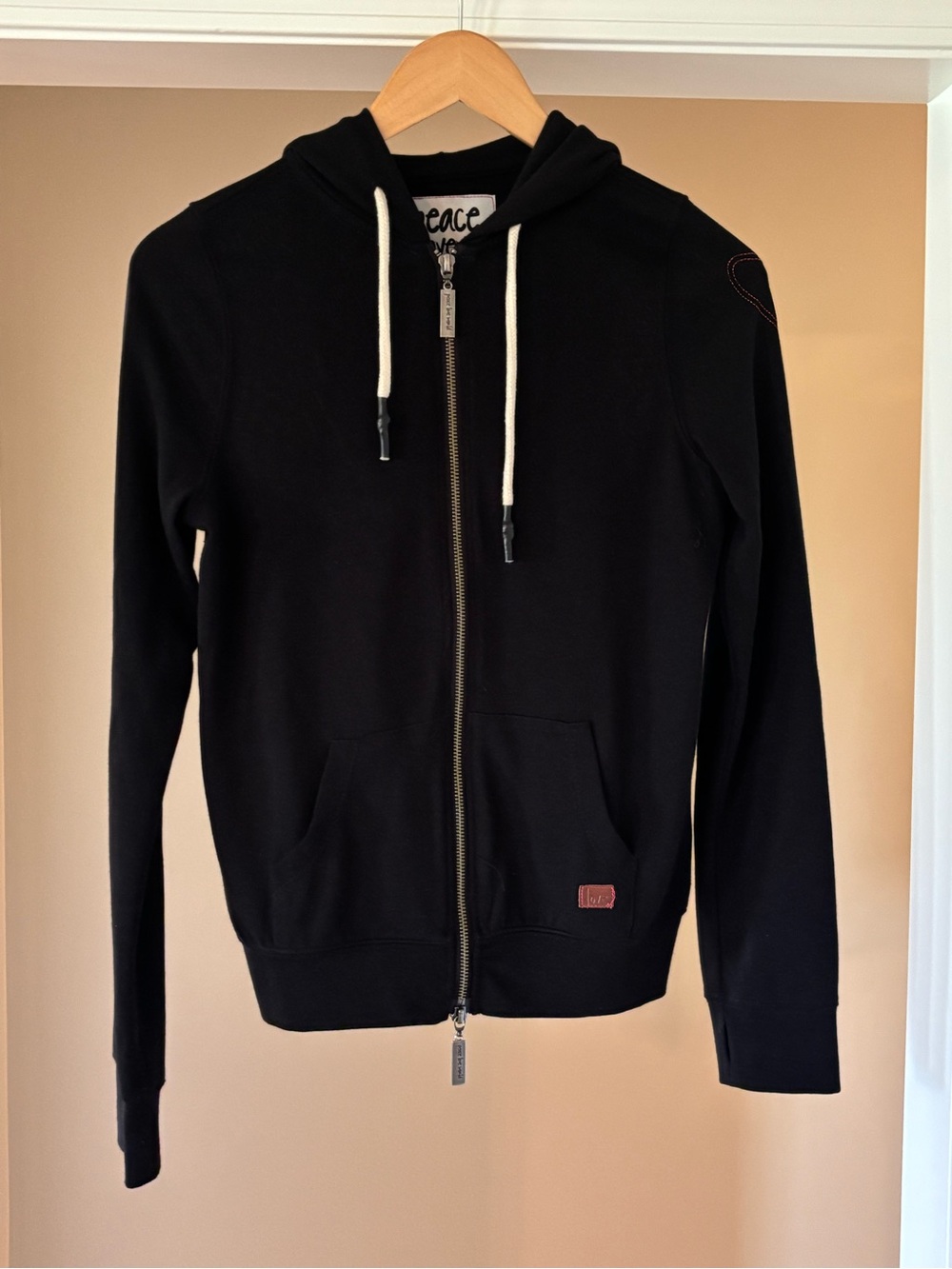 Peace Love World Black Zip Hoodie with White Drawstrings